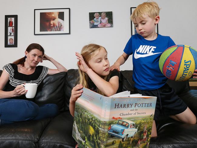 Rose Livingston with her children, Vicky 9, and Josh, 7. Picture: Ian Currie