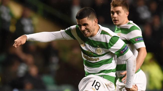 Celtic's Australian midfielder Tom Rogic has an unsuccessful shot during the UEFA Champions League Group B football match between Celtic and Paris Saint-Germain (PSG) at Celtic Park in Glasgow, on September 12, 2017. PSG won the game 5-0. / AFP PHOTO / Andy BUCHANAN