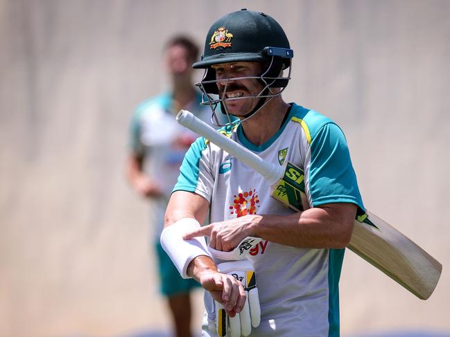 Australia's David Warner reacts as he prepares to bat during a training session at the Sydney Cricket Ground (SCG) on January 5, 2021, ahead of third cricket Test match against India. (Photo by David Gray / AFP) / / IMAGE RESTRICTED TO EDITORIAL USE - STRICTLY NO COMMERCIAL USE