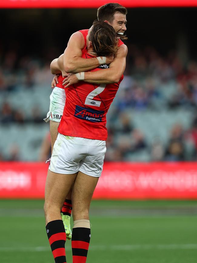 Sam Draper and Zach Merrett celebrate a goal. Picture: Getty