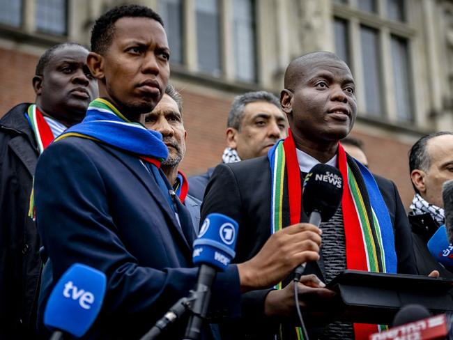 South Africa's Minister of Justice Ronald Lamola (R) speaks after first day of hearings on the genocide case against Israel brought by South Africa, in The Hague. Picture: AFP