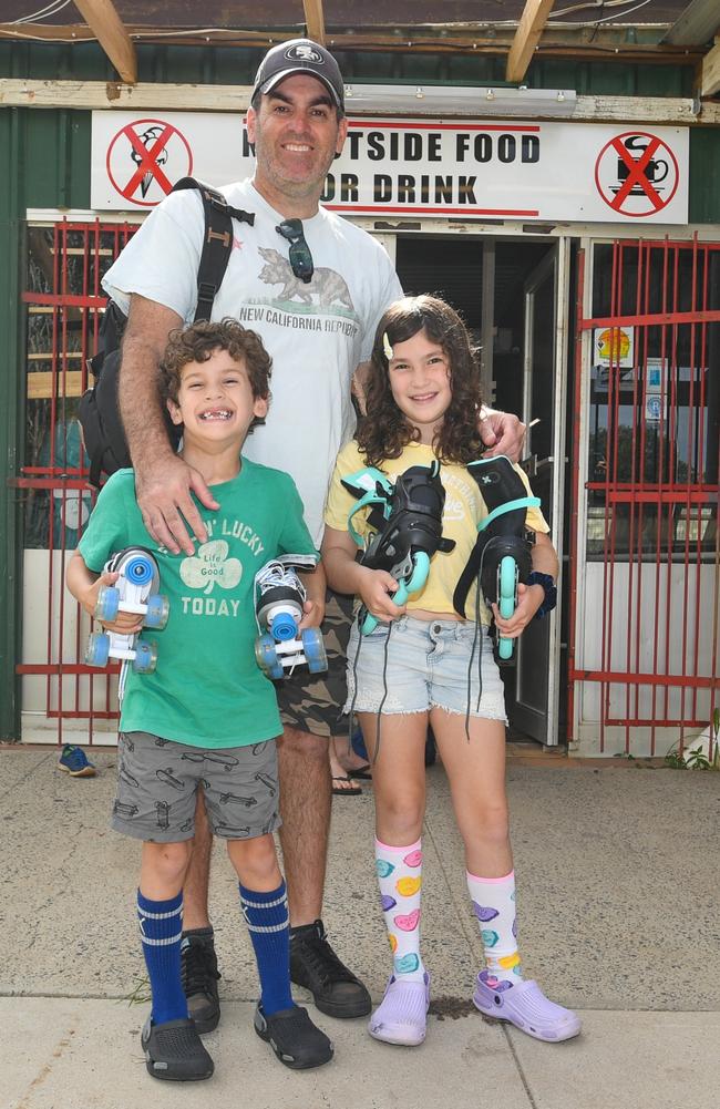 Lismore dad Anthony Bagnette with his son Asher, 6, and daughter Zephyr, 9 waiting to get onto the rink at Lismore Rollerworld. Picture: Cath Piltz