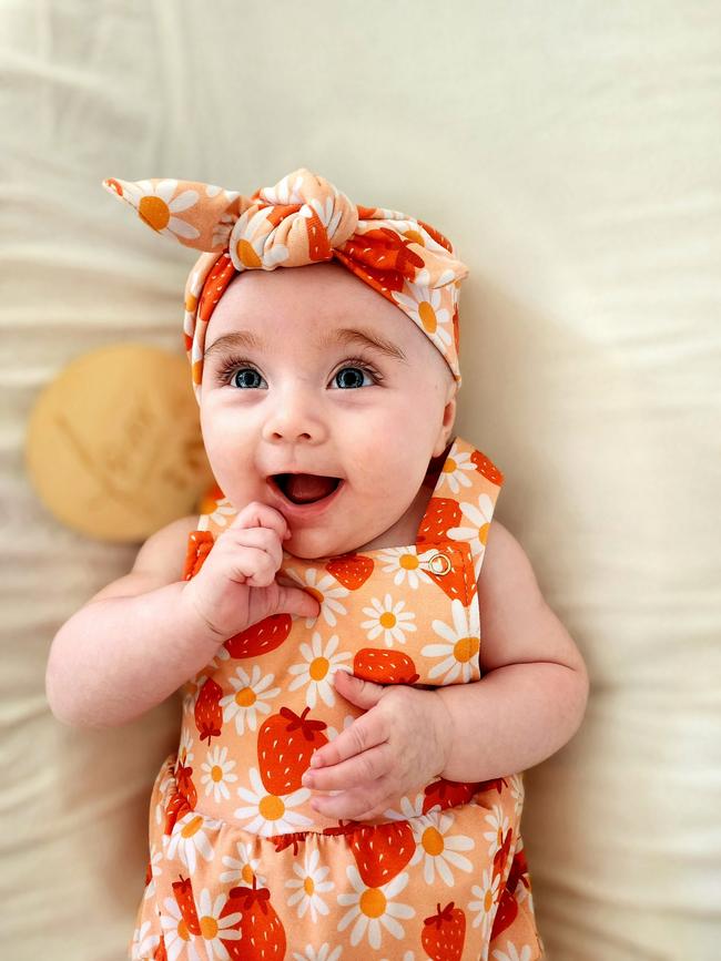 Harlow Lascelles. Six months old. Sassy, cheeky and full of personality. Harlow knows when you are taking a photo of her as the smiles immediately come out.,