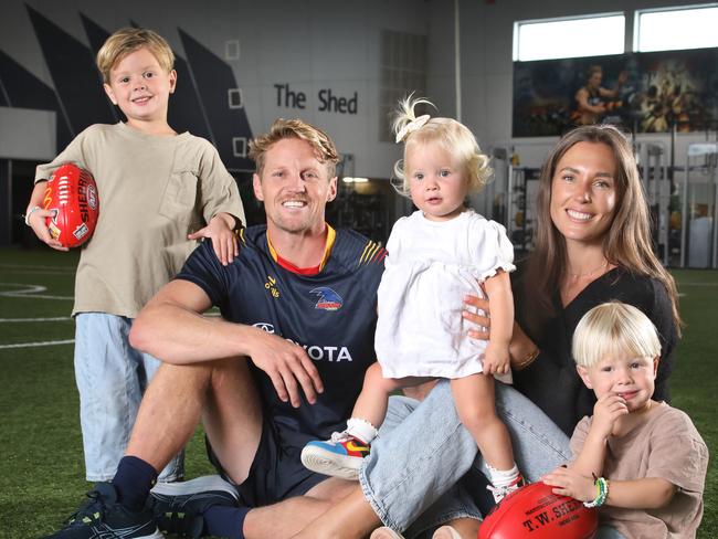 Crows Training - Rory Sloane Announcement - Rory Sloane with his family, wife Bel and kids, Sonny,4, Bohdi,3, and Summer,1, has decided to retire.Crows training ahead of this weeks showdown. 29 April 2024. Picture Dean Martin