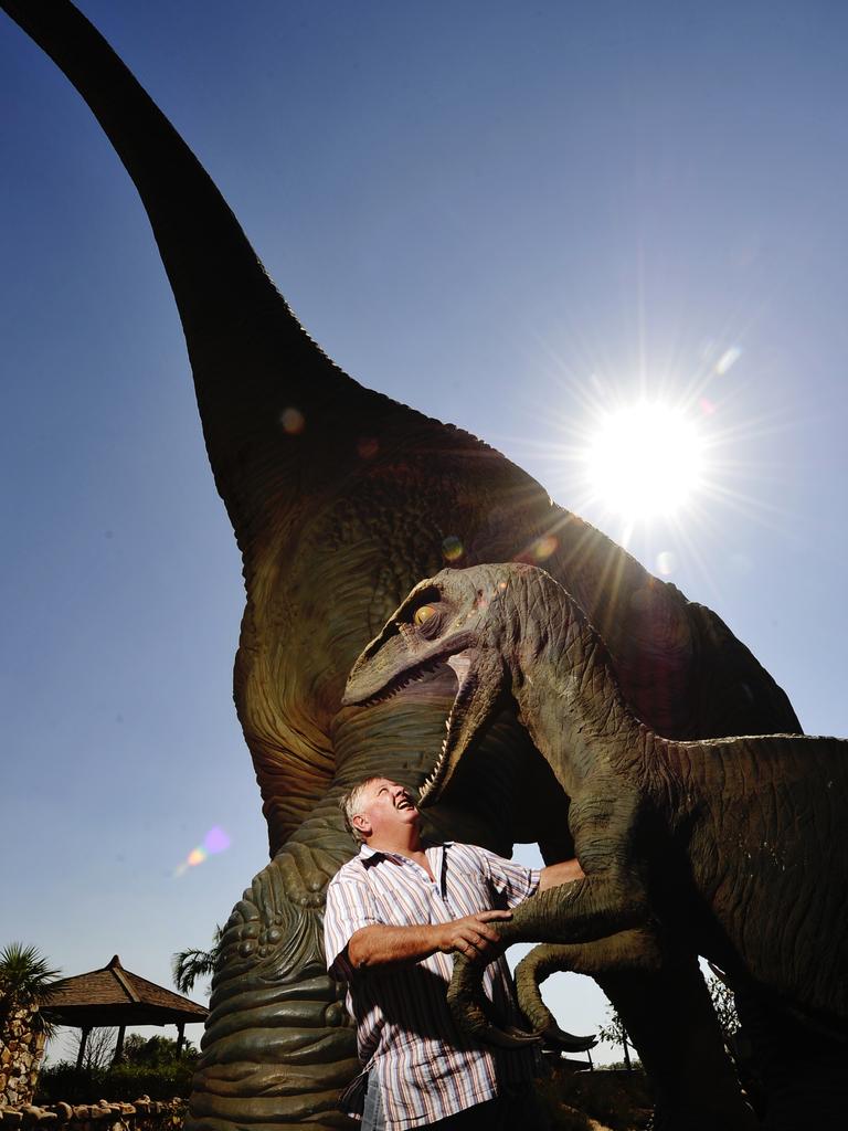 Stonemason Tom Finlay with one of his raptors and Big Kev behind him. Picture: File