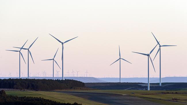 This picture taken from Alto de Coculina, Burgos province, on April 4, 2023, shows wind turbines in a wind farm. (Photo by OSCAR DEL POZO / AFP)
