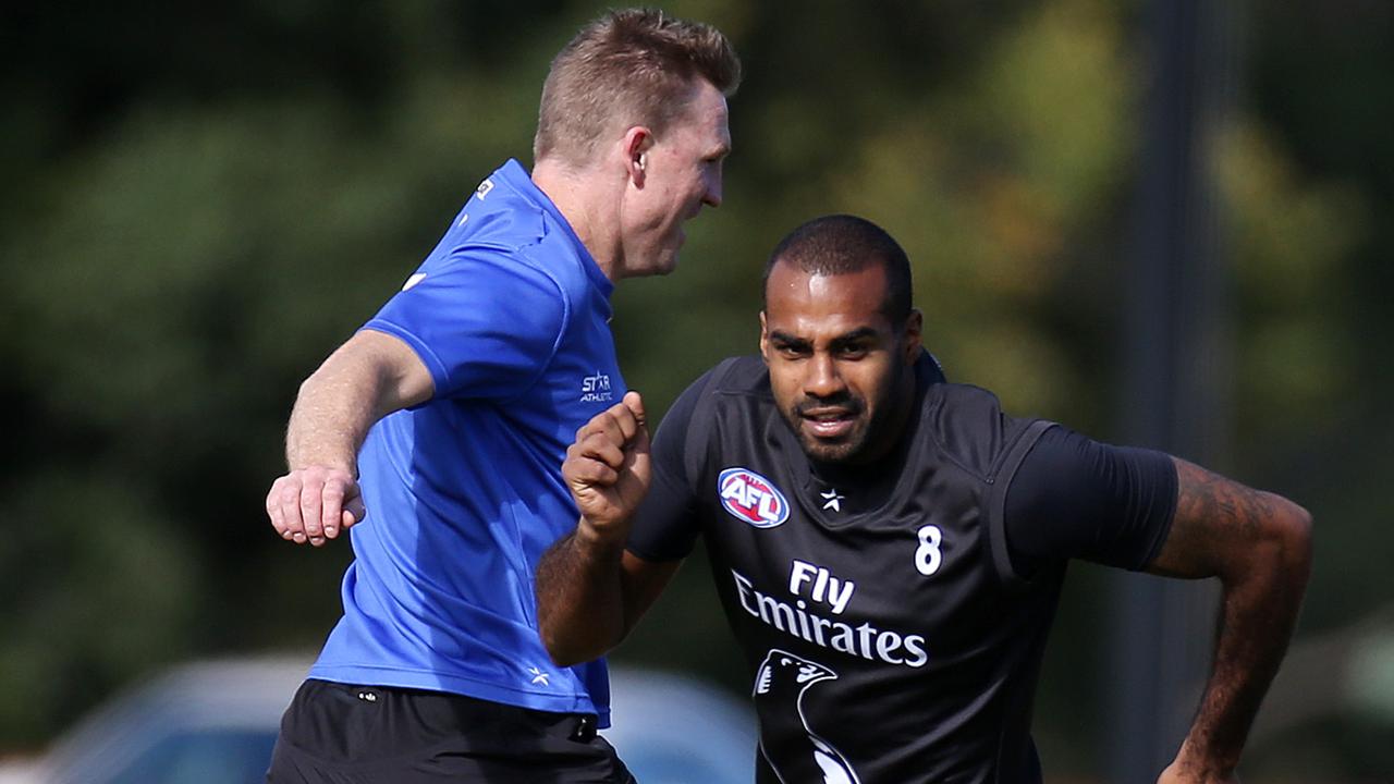 Collingwood coach Nathan Buckley and ex-Magpie Heritier Lumumba. Picture: Wayne Ludbey