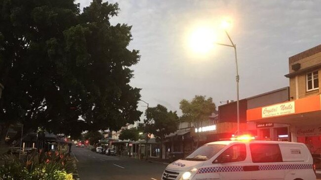 Police investigate an assault on Boundary St in West End.