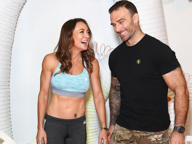 Steve 'Commando' Willis  and Michelle Bridges pose on the Slime Machine ahead of the Nickelodeon Slimefest 2014 matinee show at Sydney Olympic Park Sports Centre. Picture: Don Arnold/Getty Images for Nickelodeon Australia