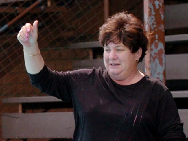 Principal Philomena Downey , with students , in the pool ,at the Murri school in Acacia Ridge , Brisbane. pic Lyndon Mechielsen 3/11/04