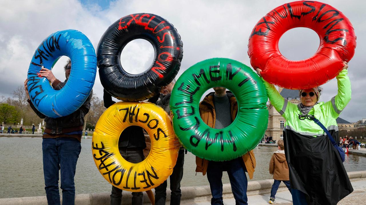 Activists of the collective Le Revers de la Médaille at the Jardin du Luxembourg in March during a demonstration to draw attention to social inequality exacerbated by the upcoming Paris 2024 Olympic Games. Picture: Geoffroy Van Der Hasselt / AFP