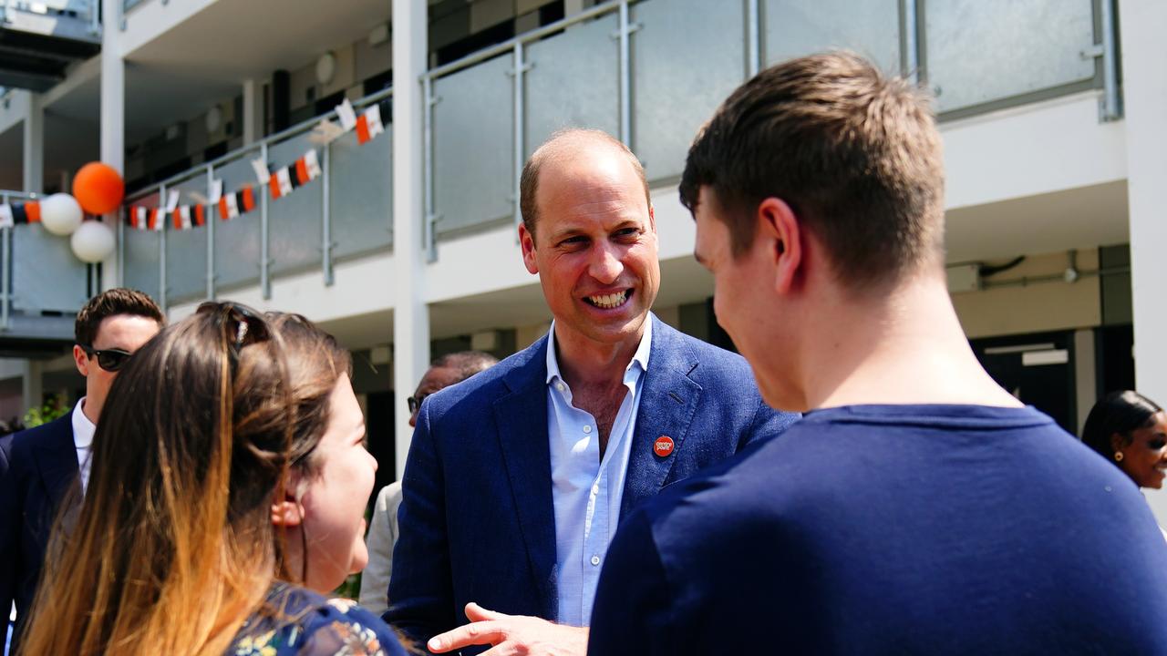 Prince William chatting with residents of the new housing development. PictureGetty Images