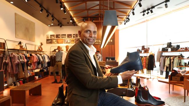 RM Williams CEO Raju Vuppalapati with the new boot designed by Marc Newson at the Bondi Junction store in Sydney. John Feder.