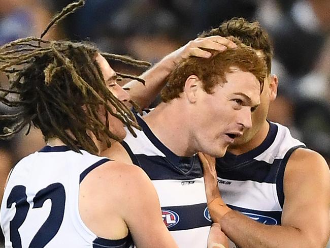 MELBOURNE, AUSTRALIA - SEPTEMBER 06: Gary Rohan of the Cats is congratulated by team mates after kicking a goal during the AFL 1st Qualifying Final match between the Geelong Cats and the Collingwood Magpies at the Melbourne Cricket Ground on September 06, 2019 in Melbourne, Australia. (Photo by Quinn Rooney/Getty Images)