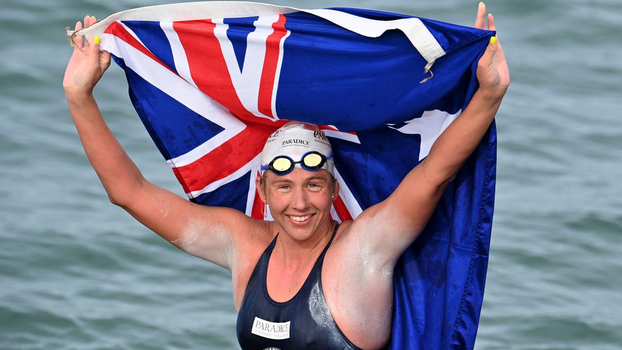 Australian marathon swimmer Chloe McCardel celebrates her record-breaking 44th swim across the English Channel after reaching France about 10 hours after she left England. Picture: AFP