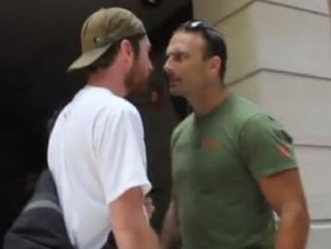 Steve Willis, known as Commando, confronts a paparazzo photographer.