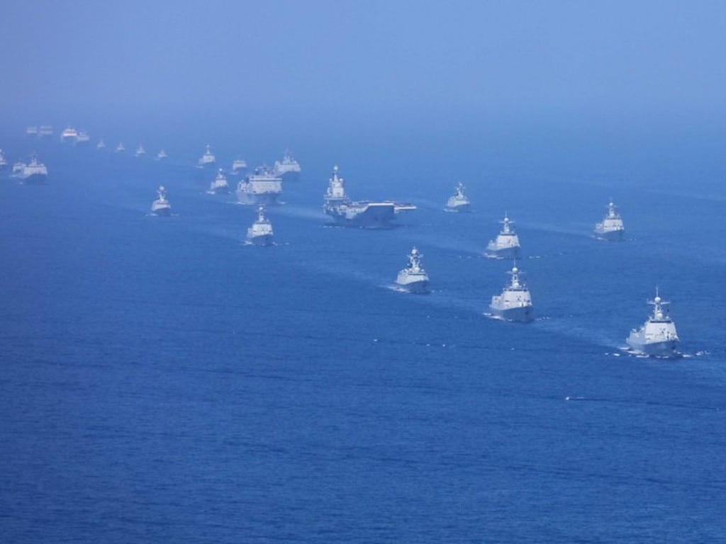 A formation of Chinese warships parade for President-for-life Xi Jinping earlier this month. Picture: Xinhua