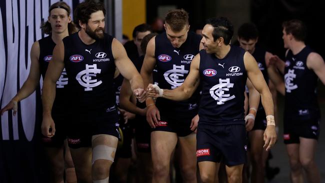 MELBOURNE, AUSTRALIA - AUGUST 21: Levi Casboult (L) and Eddie Betts of the Blues walk up the race for their last match during the 2021 AFL Round 23 match between the Carlton Blues and the GWS Giants at Marvel Stadium on August 21, 2021 in Melbourne, Australia. (Photo by Michael Willson/AFL Photos via Getty Images)