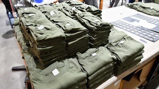 Prison-green shirts are made by inmates in the textiles workshop at the Woodford Correctional Centre. Picture: Patrick Woods.