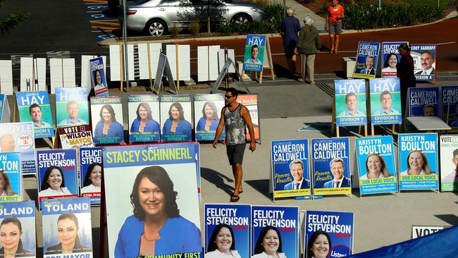 Council candidate signage at the Helensvale Library pre-polling venue during the election. Picture: by David Clark