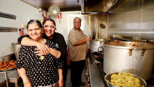 Arti Sham pictured with her mum and dad Kata and Radhaya Sham at their Rajshahi Indian Restaurant which has been doing a roaring trade during COVID-19 and has been making a point of giving back to the community. Picture: Sue Graham