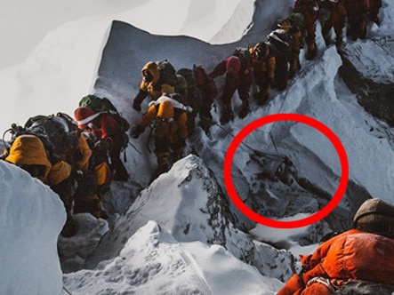 Elia Saikaly’s disturbing photograph shows tourist climbing over a dead body to continue their journey.