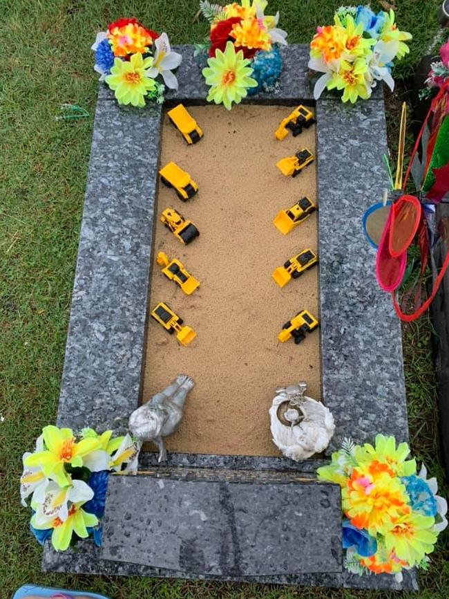 Baby Hayden Frost's gravesite with the trucks taken on Sunday January 3. Supplied.