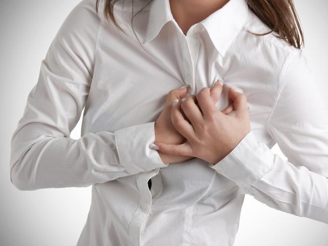 Generic photo of a woman having a heart attack - chest pains. Picture: iStock