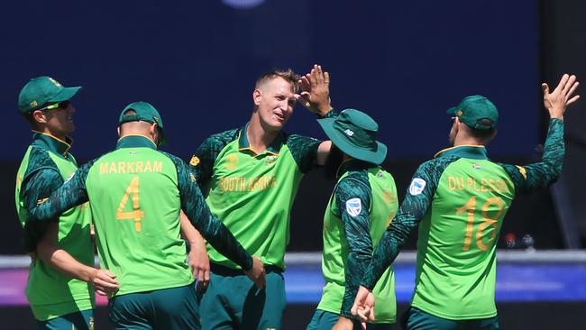 Chris Morris (C) starred in South Africa’s World Cup campaign after being initially left out. Picture: AFP