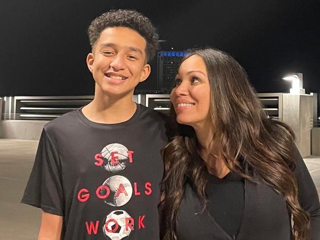 In this undated photo provided by Megan Garcia of Florida in October 2024, she stands with her son, Sewell Setzer III. The mother of 14-year-old Sewell Setzer III is suing Character.AI, the tech company that created a 'Game of Thrones' AI chatbot she believes drove him to commit suicide on Feb. 28. (Megan Garcia via AP)