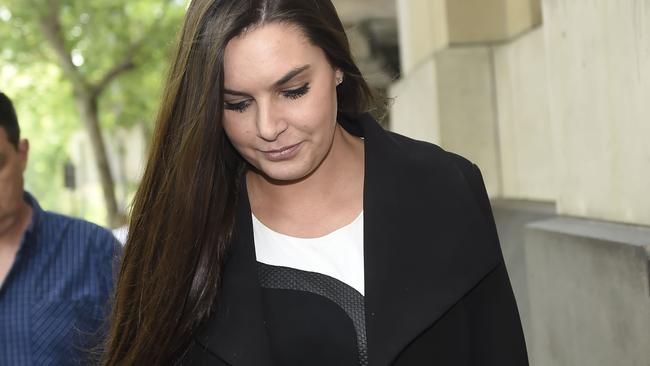 "St Kilda Schoolgirl" Kim Guthrie leaves the Victorian Supreme Court of Appeals after a judge decided Ricky Nixon can publish his tell-all book in Melbourne, Friday, Nov. 27, 2015. Former AFL player agent Ricky Nixon can publish his book despite Kim Duthrie's push to ban it, a Victorian court says. (AAP Image/Mal Fairclough) NO ARCHIVING