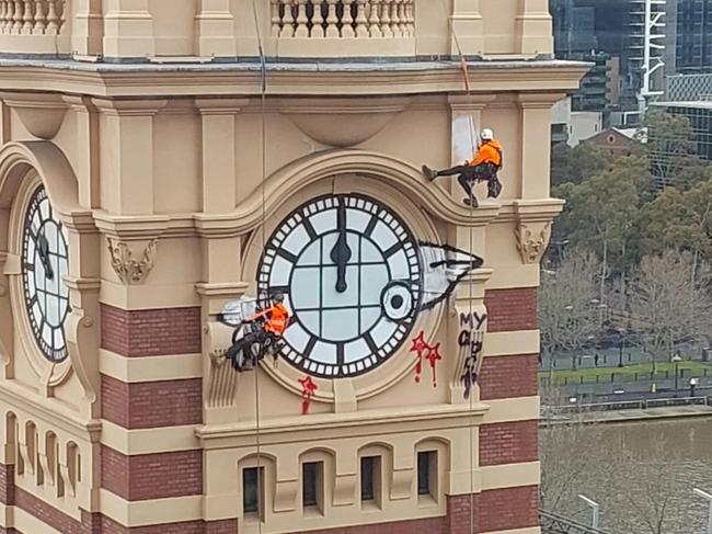 The Flinders Street Station clock was stopped during its clean-up. Picture: Reddit