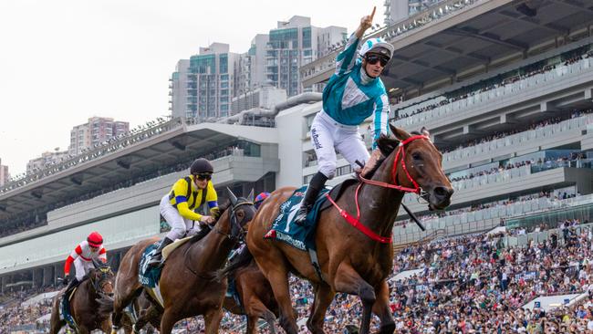 James McDonald wins the Group 1 QE II Cup with Romantic Warrior. Picture: Lo Chun Kit-Getty Images