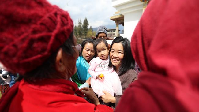 The family was mobbed by the crowd as they recognised them. Picture: Alex Coppel 