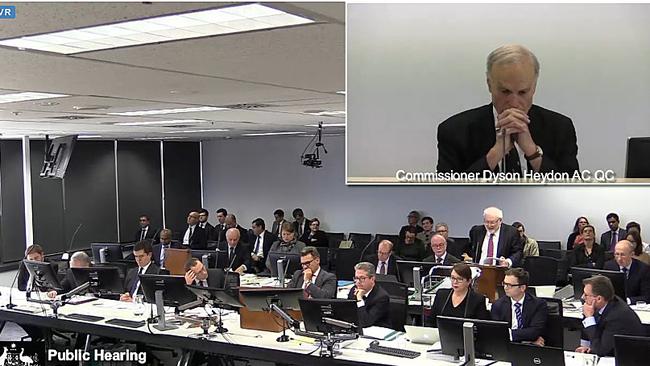 A screengrab obtained Friday, Aug. 21, 2015 of Commissioner Dyson Heydon AC QC (top right) during a hearing of the Royal Commission into Trade Union Governance and Corruption in Sydney. CFMEU lawyer John Agius has questioned why an original email, from the event organiser to Mr Heydon, referred to state donation compliance rules and yet the line was missing from copies released by the commission on Monday. (AAP Image/Royal Commission into Trade Union Governance and Corruption) NO ARCHIVING, EDITORIAL USE ONLY