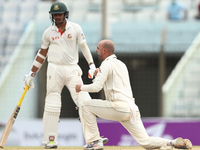 Lyon celebrates trapping danger man Tamim Iqbal Khan lbw.