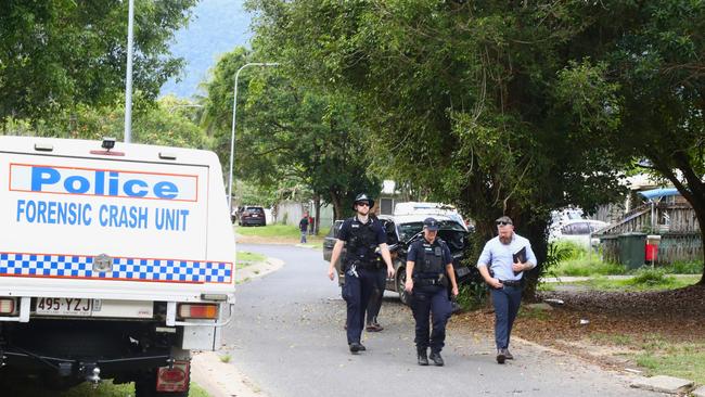 Investigating officers attended the car crash in Mooroobool on Sunday morning. Picture: Peter Carruthers