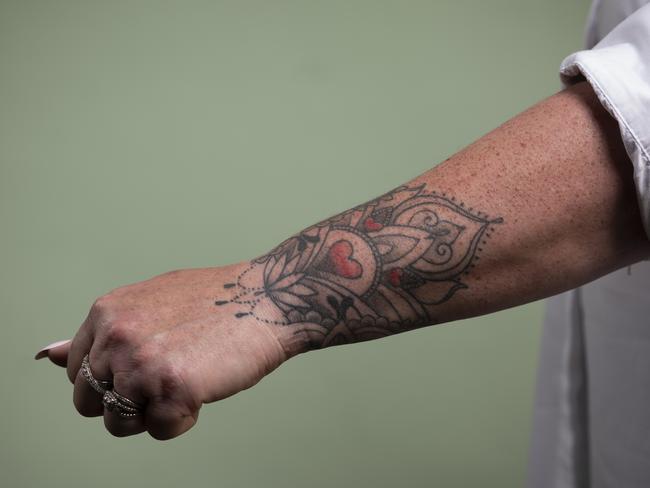 The tattoo Beck Rogers had done after exposing her father. Picture: Sean Davey