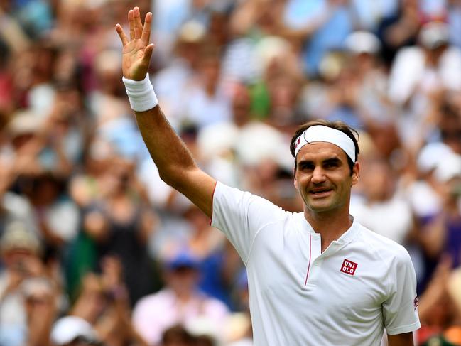 LONDON, ENGLAND - JULY 09:  Roger Federer of Switzerland thanks the crowd after winning his Men's Singles fourth round match against Adrian Mannarino of France on day seven of the Wimbledon Lawn Tennis Championships at All England Lawn Tennis and Croquet Club on July 9, 2018 in London, England.  (Photo by Clive Mason/Getty Images) ***BESTPIX***