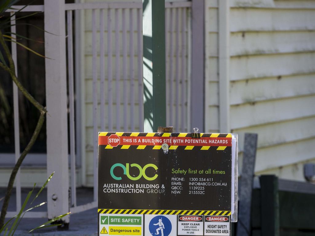 An abandoned / unoccupied, flood damaged house on Bale Street, Rocklea. A hazard warning sign is out the front of the house. Many houses in Rocklea have been unoccupied since the floods in February, with some even unoccupied since the 2011 flood. Picture : Matthew Poon.