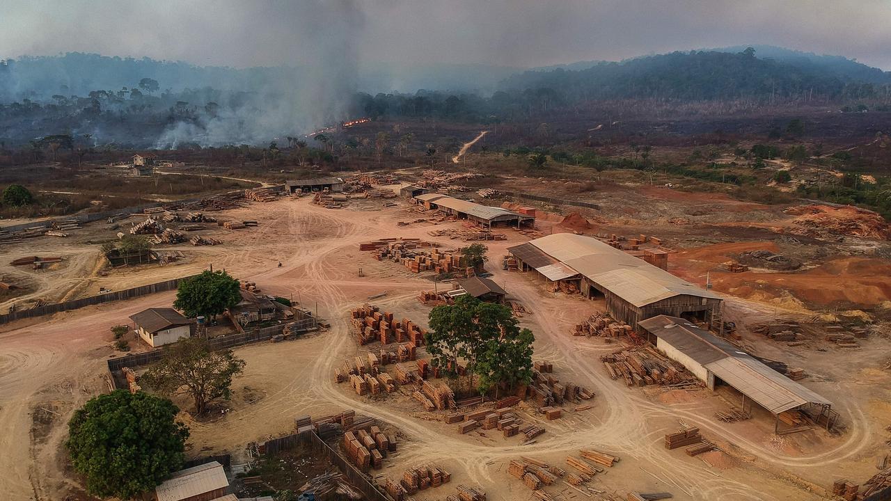 A sawmill in Moraes Almeida, -a town along a section of the trans-Amazonian highyway-, in Itaituba, Para state. Logging, along with cattle ranching, has devastated the Amazon and shows no sign of slowing. (Photo by Nelson Almeida / AFP)