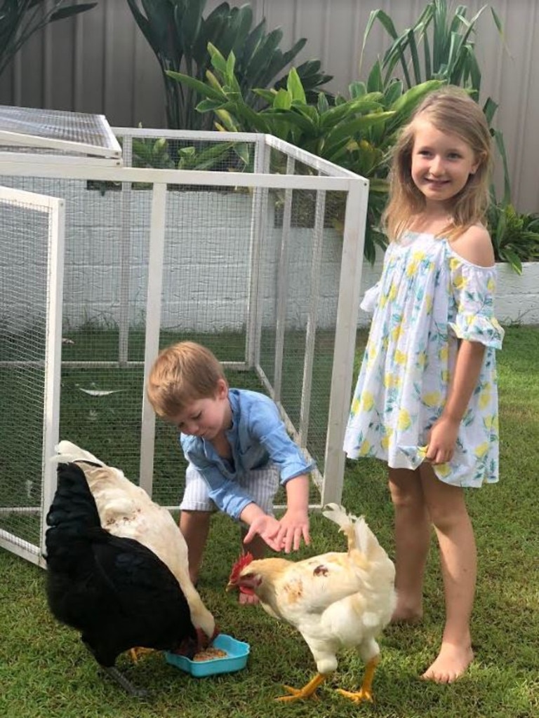 Autumn and Archie Venables getting up close and personal with ‘the girls’. Picture: Supplied.