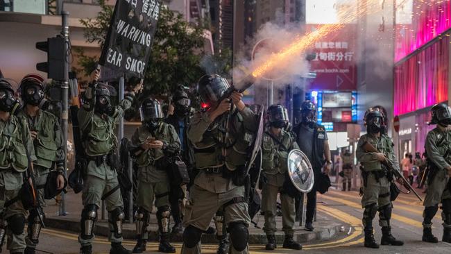 A police officer fires teargas at protesters on September 8, 2019 in Hong Kong, China. Picture: Getty