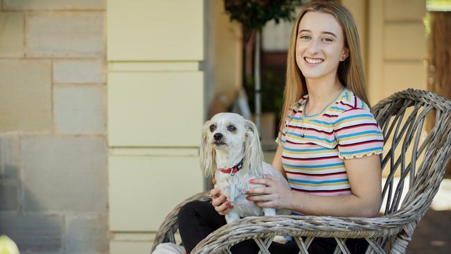 Georgie Trotter’s dog Kobbie Mae features in her book about money. Picture: AAP/Mike Burton