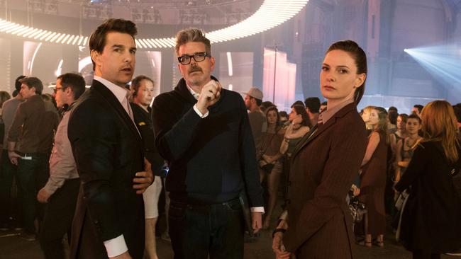 Cruise, left, director Christopher McQuarrie and Rebecca Ferguson on the set of Mission: Impossible — Fallout.