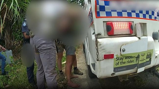 Tully Criminal Investigation Branch detectives, alongside other QPS units, have arrested a high-risk offender in Bingil Bay, near Mission Beach. Picture: Supplied.