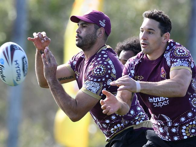 Greg Inglis (left) and Billy Slater are seen during the Queensland State of Origin team training session at Sanctuary Cove on the Gold Coast, Sunday, June 3, 2018. (AAP Image/Dave Hunt) NO ARCHIVING