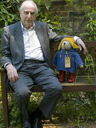 British author Michael Bond sits with a Paddington Bear toy in 2008.  Picture:  AP