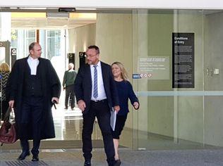 Jane Elizabeth Hooper (far right) leaves Brisbane District Court after pleading guilty to taking drugs into a Queensland jail.