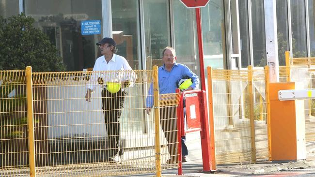 Workers arrive at the Point Henry smelter this morning. Picture: Alison Wynd